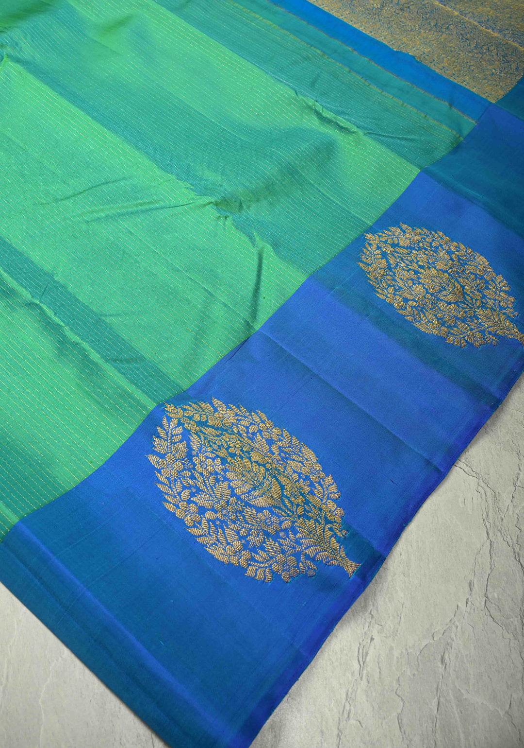 Sea Green Dual tone Pure Kanjivaram Silk Handloom Saree with Vairaoosi Zari Stripes and Distinct Floral Motifs on Contrast Border  | SILK MARK CERTIFIED