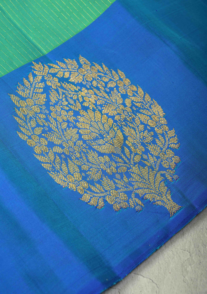 Sea Green Dual tone Pure Kanjivaram Silk Handloom Saree with Vairaoosi Zari Stripes and Distinct Floral Motifs on Contrast Border  | SILK MARK CERTIFIED