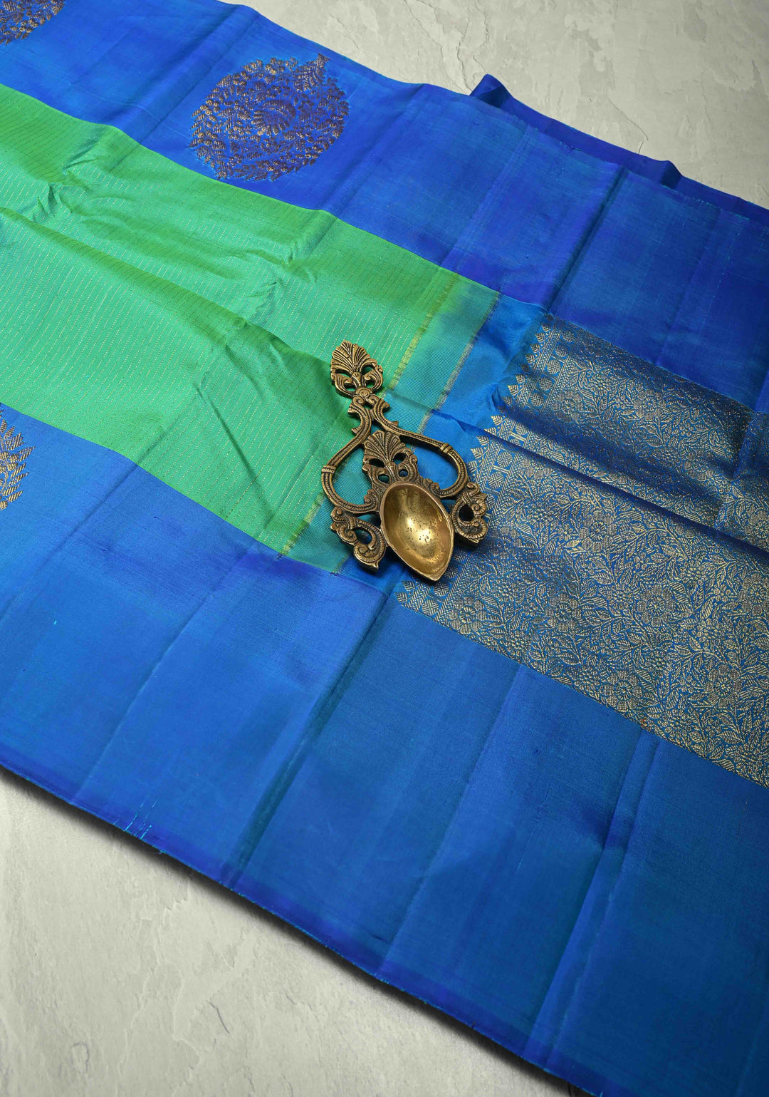 Sea Green Dual tone Pure Kanjivaram Silk Handloom Saree with Vairaoosi Zari Stripes and Distinct Floral Motifs on Contrast Border  | SILK MARK CERTIFIED