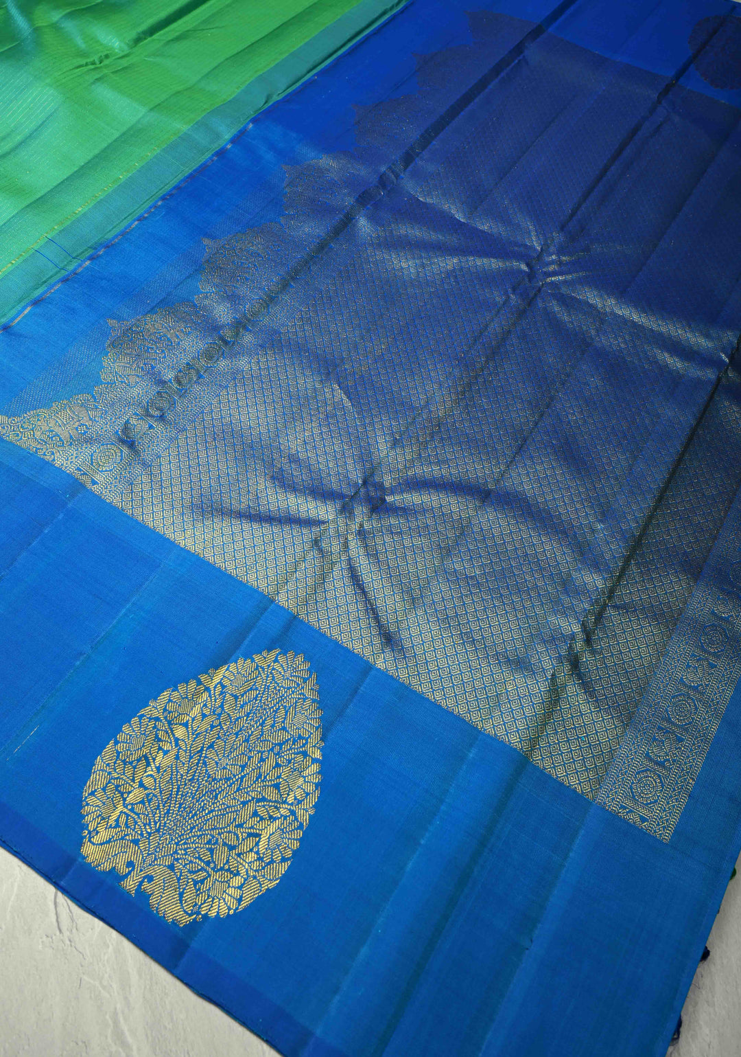 Sea Green Dual tone Pure Kanjivaram Silk Handloom Saree with Vairaoosi Zari Stripes and Distinct Tree Motifs on Contrast Border  | SILK MARK CERTIFIED