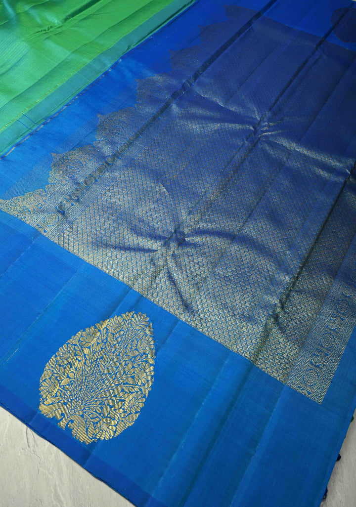 Sea Green Dual tone Pure Kanjivaram Silk Handloom Saree with Vairaoosi Zari Stripes and Distinct Tree Motifs on Contrast Border  | SILK MARK CERTIFIED