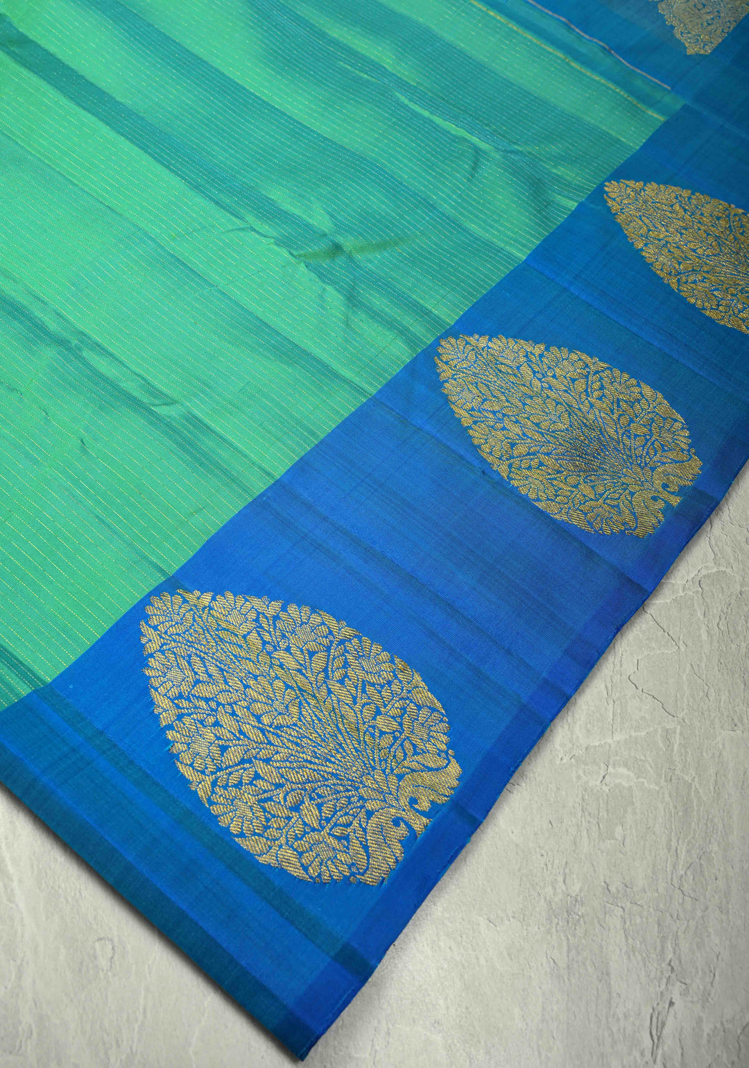 Sea Green Dual tone Pure Kanjivaram Silk Handloom Saree with Vairaoosi Zari Stripes and Distinct Tree Motifs on Contrast Border  | SILK MARK CERTIFIED