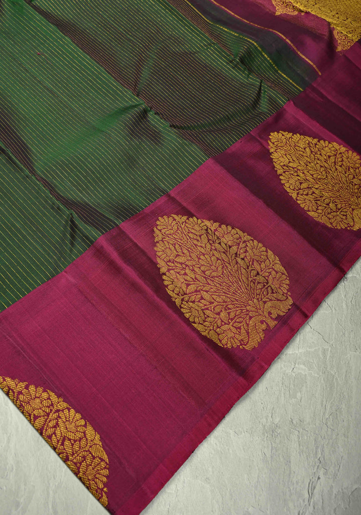 Dark Green Pure Kanjivaram Silk Handloom Saree with Vairaoosi Zari Stripes and Distinct Tree Motifs on Contrast Border  | SILK MARK CERTIFIED