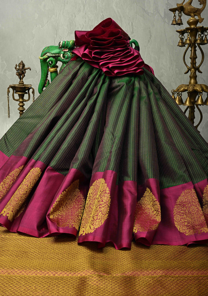 Dark Green Pure Kanjivaram Silk Handloom Saree with Vairaoosi Zari Stripes and Distinct Tree Motifs on Contrast Border  | SILK MARK CERTIFIED