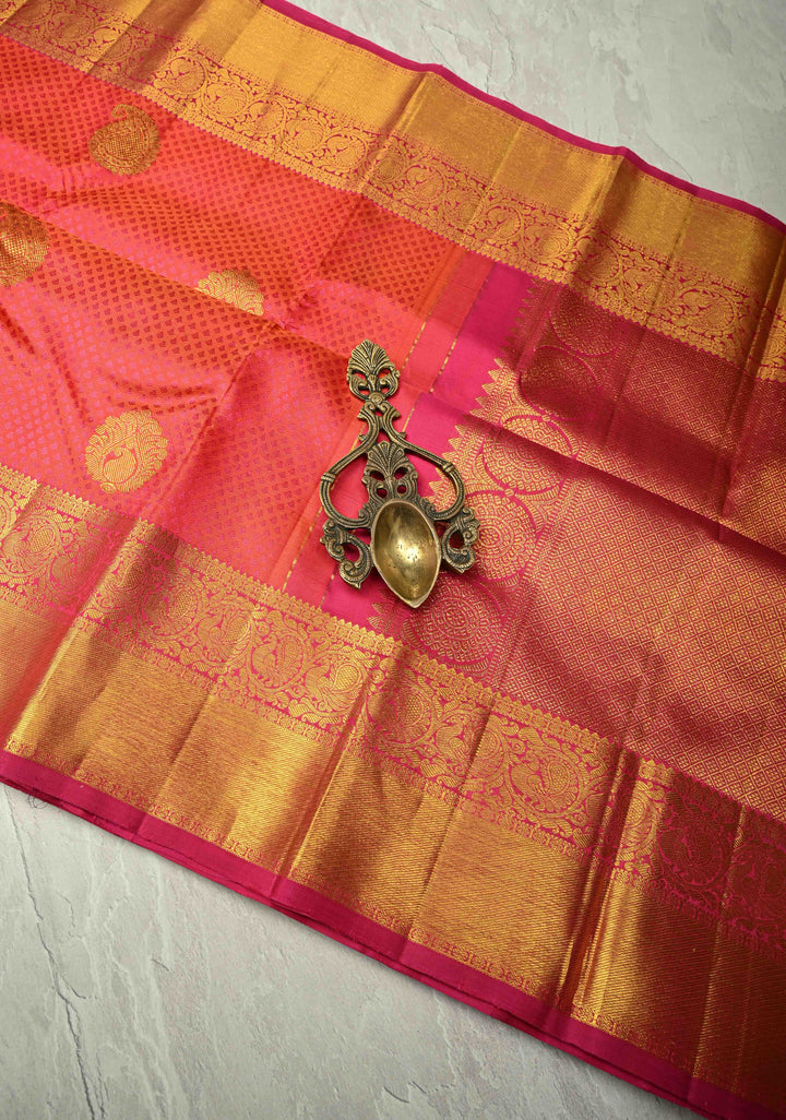 Orange-Pink Dual tone Self Brocade on Kanjivaram Pure Silk Saree with Paisley Buttas and Zari Border | SILK MARK CERTIFIED