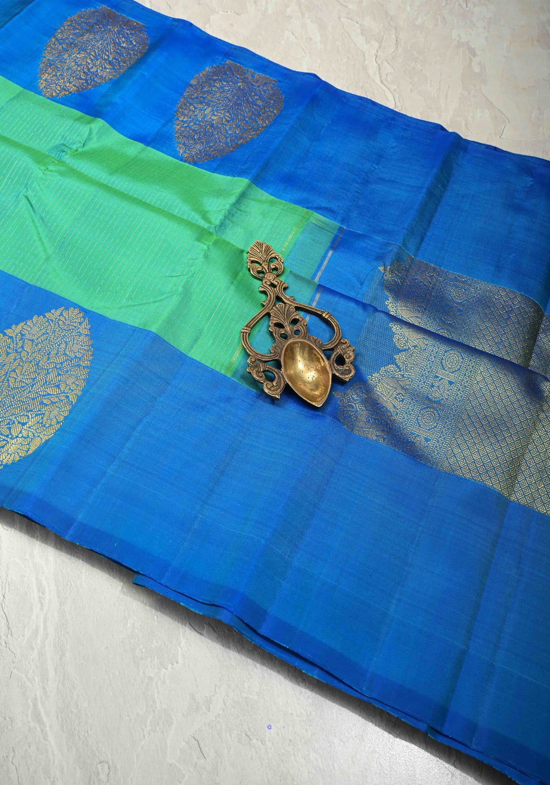 Green-Blue Dual Tone Pure Kanjivaram Silk Handloom Saree with Vairaoosi Zari Stripes and Distinct Floral Motifs on Contrast Border | SILK MARK CERTIFIED
