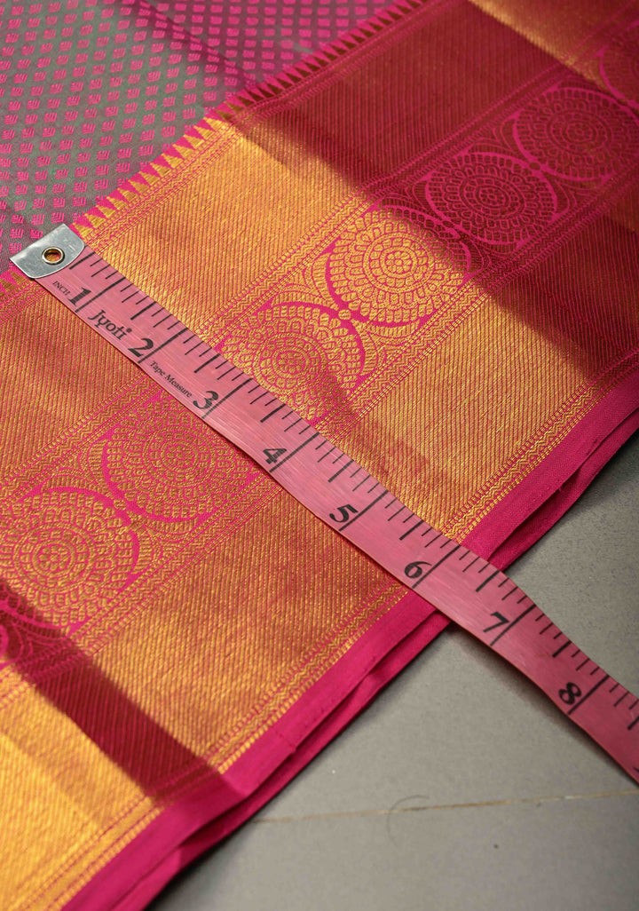 Magenta-Emerald Green Dual Tone Self Brocade on Pure Kanjivaram Saree with Paisley Motifs and Zari Border | SILK MARK CERTIFIED