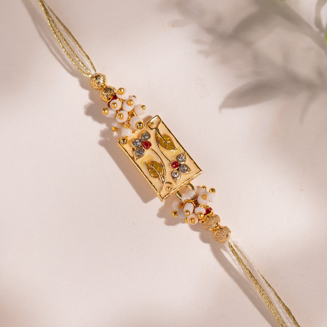 Bond Of Blossoms Beige Floral Rakhi For Brother | SHOBITAM