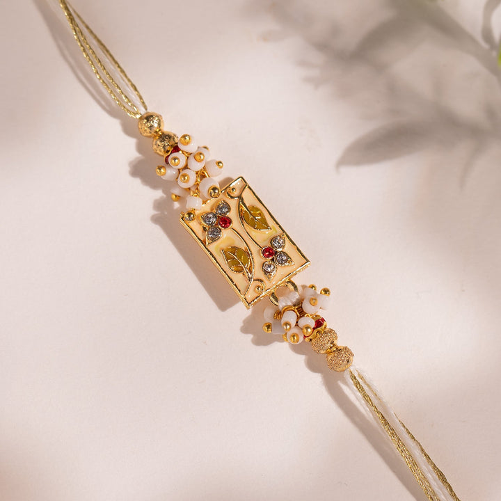 Bond Of Blossoms Beige Floral Rakhi For Brother | SHOBITAM