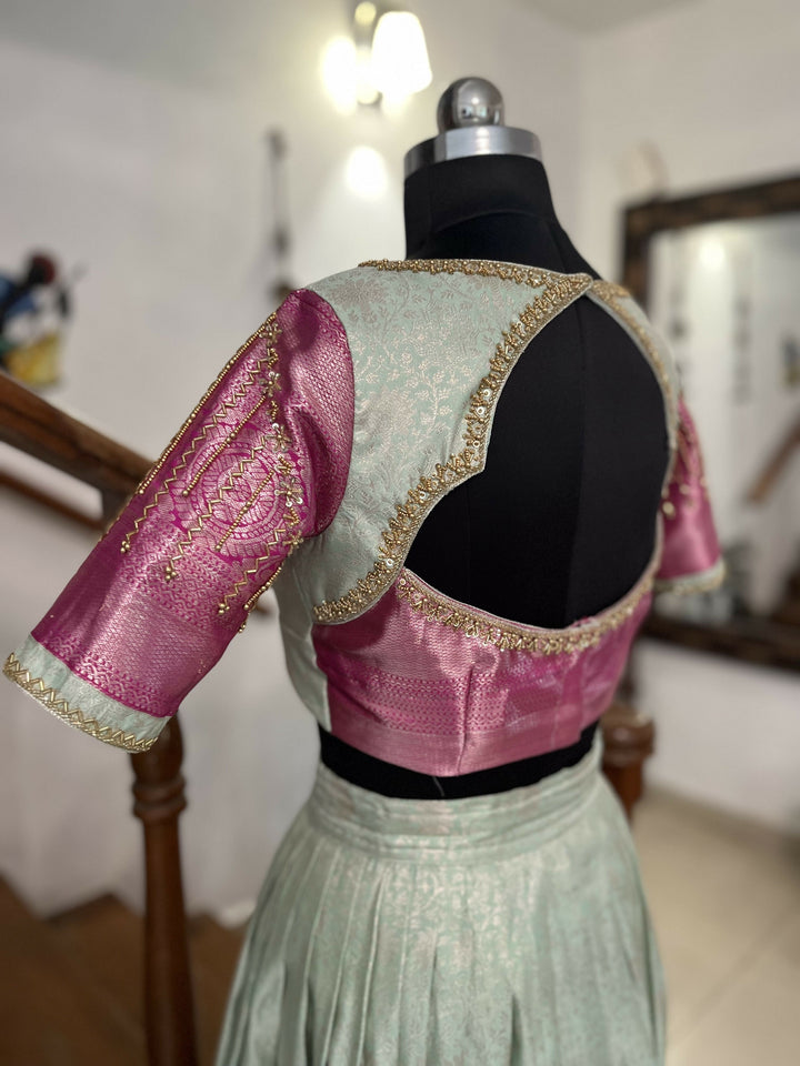 Yuvathi Mint green silk half Saree lehenga set with aari work