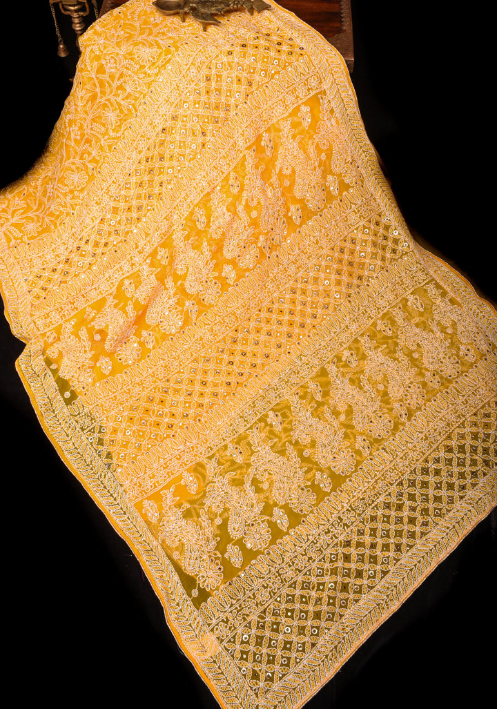 Authentic Hand Chikankari with Mukesh embellishments on Yellow Georgette Saree