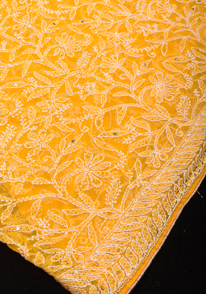 Authentic Hand Chikankari with Mukesh embellishments on Yellow Georgette Saree