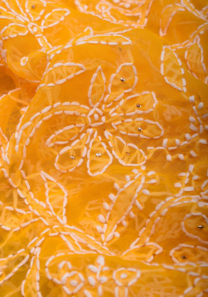 Authentic Hand Chikankari with Mukesh embellishments on Yellow Georgette Saree