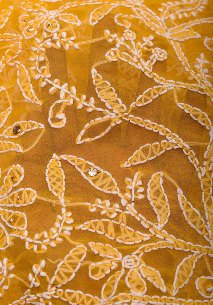 Authentic Hand Chikankari with Mukesh embellishments on Yellow Georgette Saree