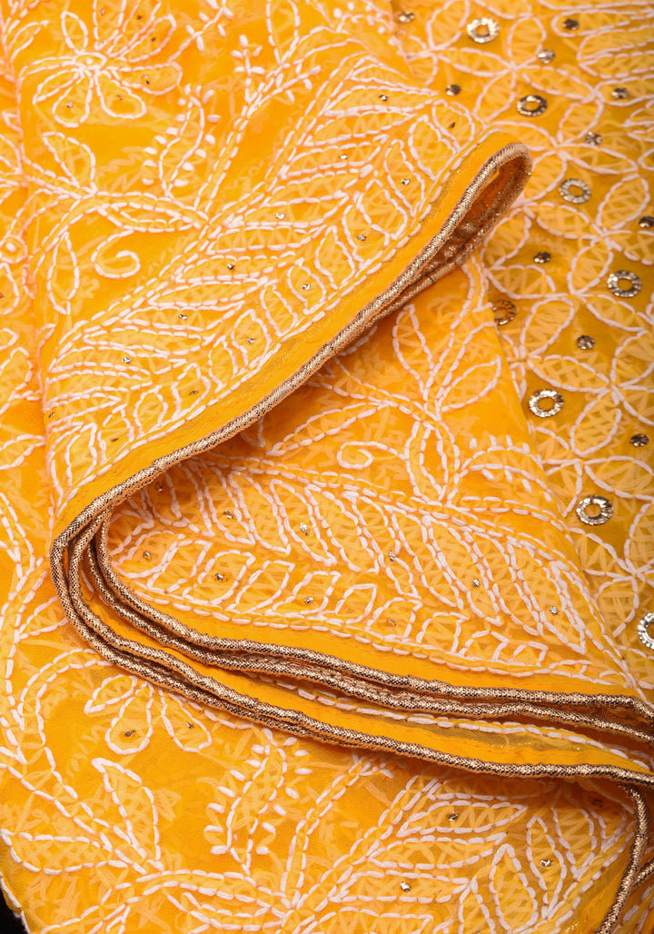 Authentic Hand Chikankari with Mukesh embellishments on Yellow Georgette Saree
