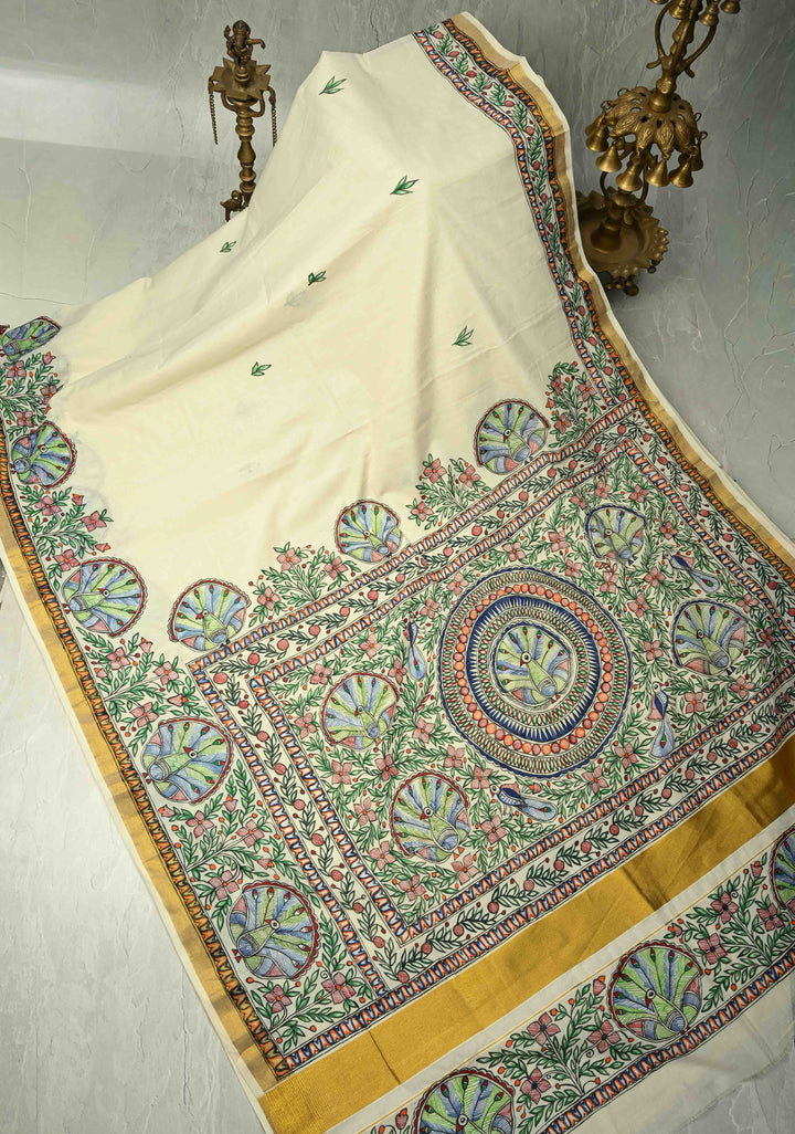 Off White Keral Cotton Saree with Madhubani Hand painted and Minimal Zari Border