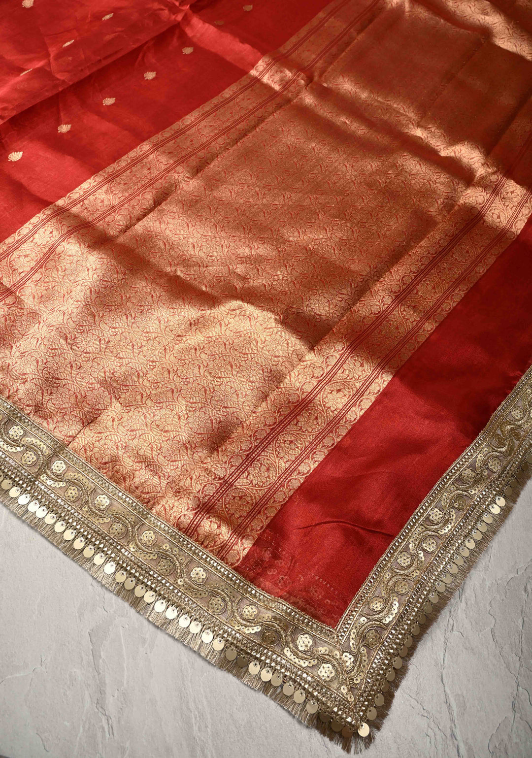 Orangish Red Organza Tissue Silk Saree with Kadhuwa Zari Buttas and Fancy Lace Trim Border | SILK MARK CERTIFIED