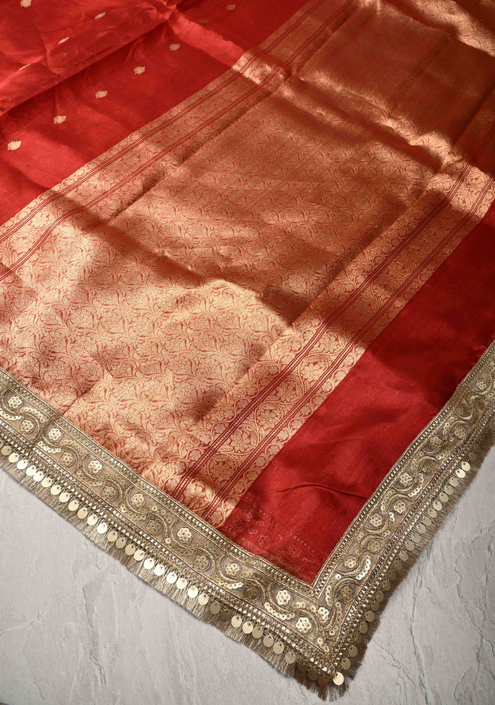 Orangish Red Organza Tissue Silk Saree with Kadhuwa Zari Buttas and Fancy Lace Trim Border | SILK MARK CERTIFIED
