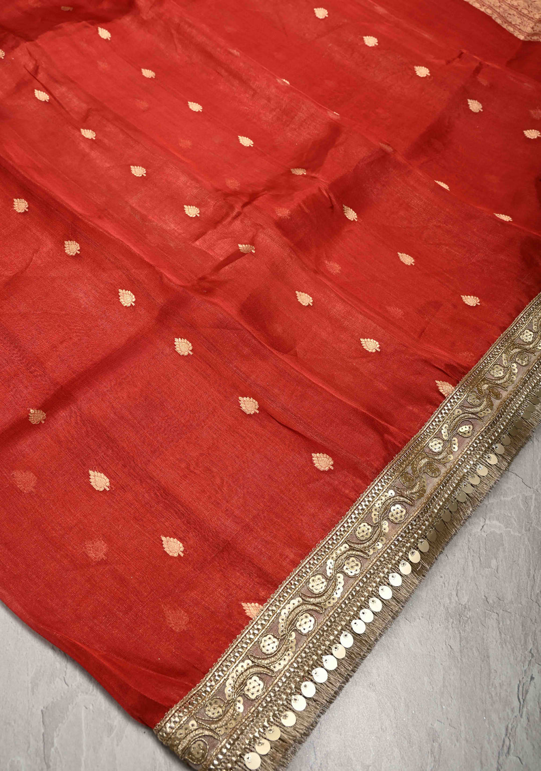 Orangish Red Organza Tissue Silk Saree with Kadhuwa Zari Buttas and Fancy Lace Trim Border | SILK MARK CERTIFIED