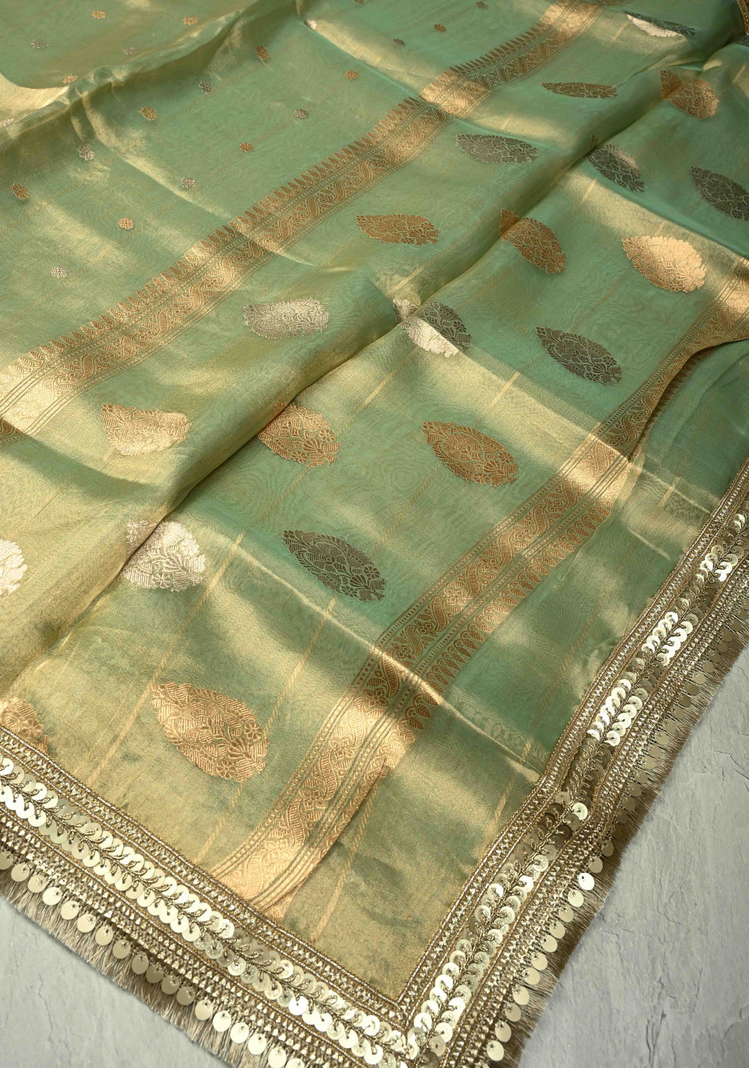 Green Organza Tissue Silk Saree with Kadhuwa Sona Rupa Zari Buttis and Fancy Lace Trim Border | SILK MARK CERTIFIED | SHOBITAM