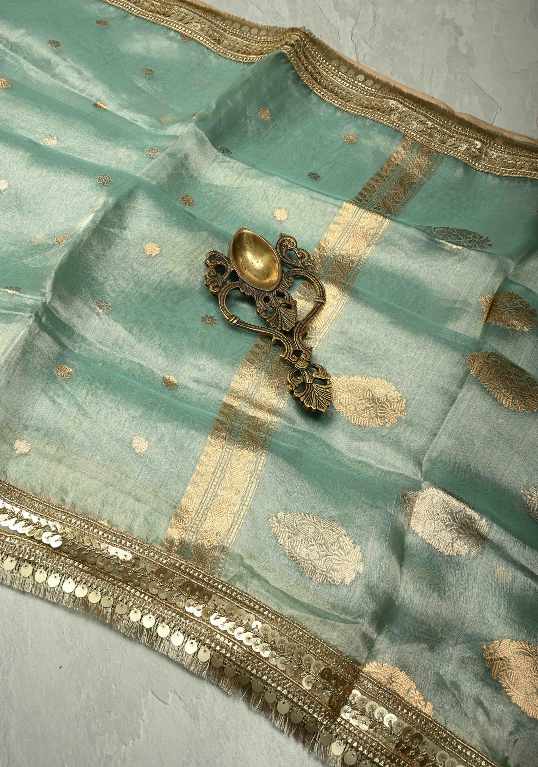 Turquoise Green Organza Tissue Silk Saree with Kadhuwa Sona Rupa Zari Buttis and Fancy Lace Trim Border | SILK MARK CERTIFIED