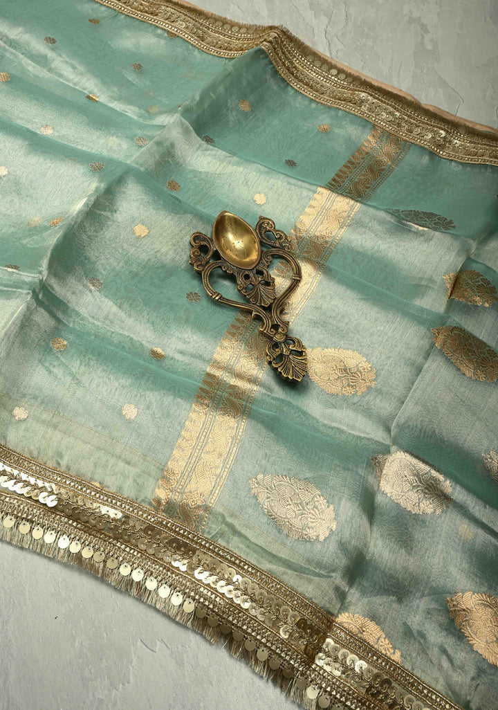 Turquoise Green Organza Tissue Silk Saree with Kadhuwa Sona Rupa Zari Buttis and Fancy Lace Trim Border | SILK MARK CERTIFIED