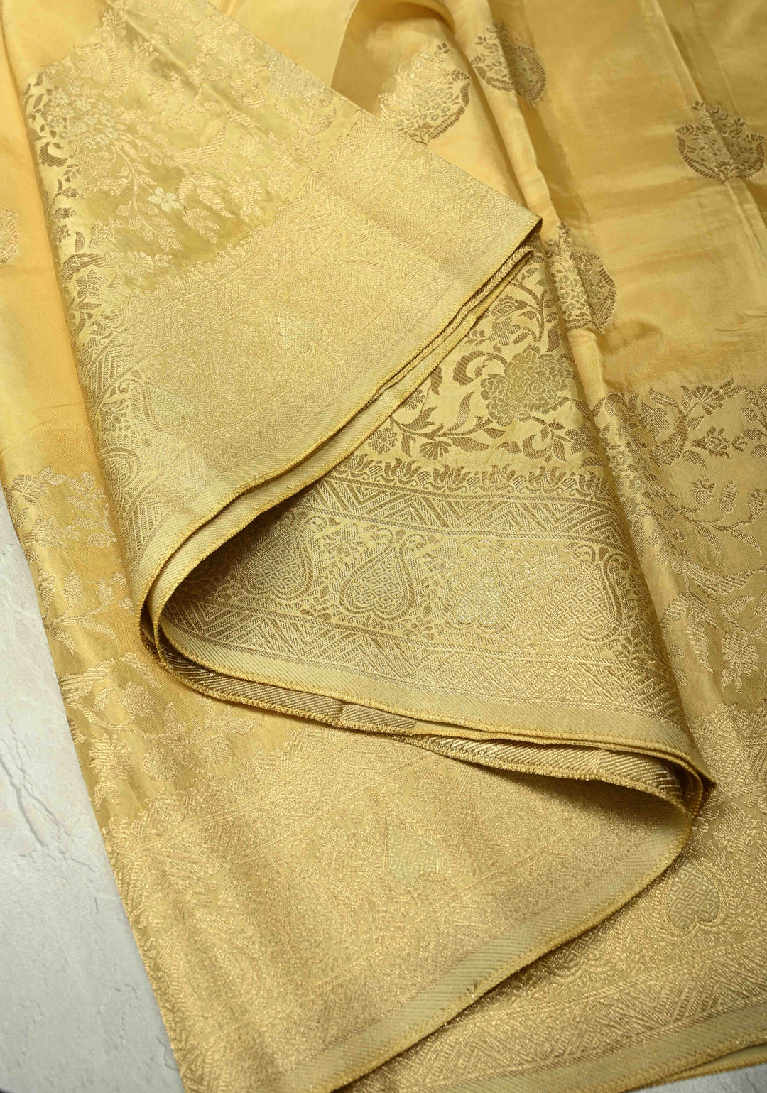 Butter Yellow Banarasi Semi Silk Saree with Zari Buttas and Floral Jaal Wide Border