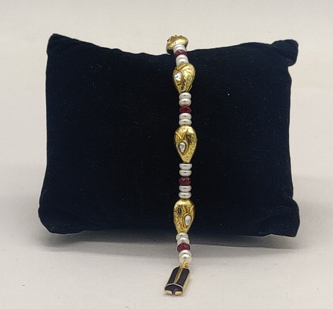 Gold-Toned Pearl Bracelet with Red Accents | SHOBITAM