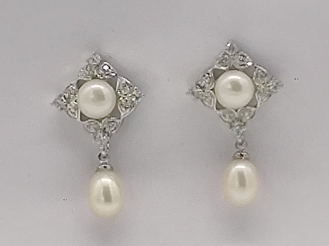Rhombus Stud Earrings with Double Pearl Design | SHOBITAM