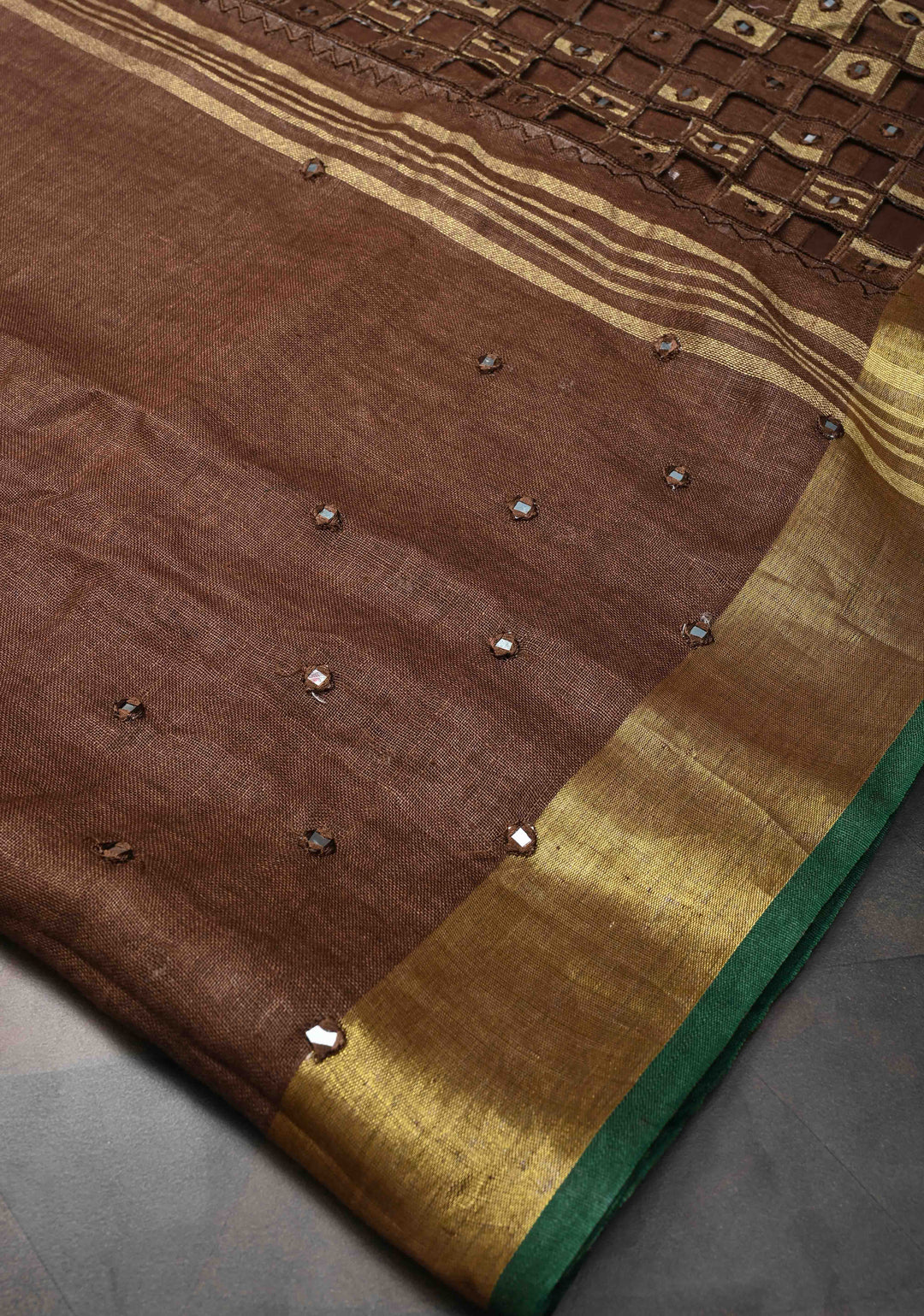 Jaali Pallu - Linen by Linen Cutwork and Mirrorwork Saree in Brown and Zari Border