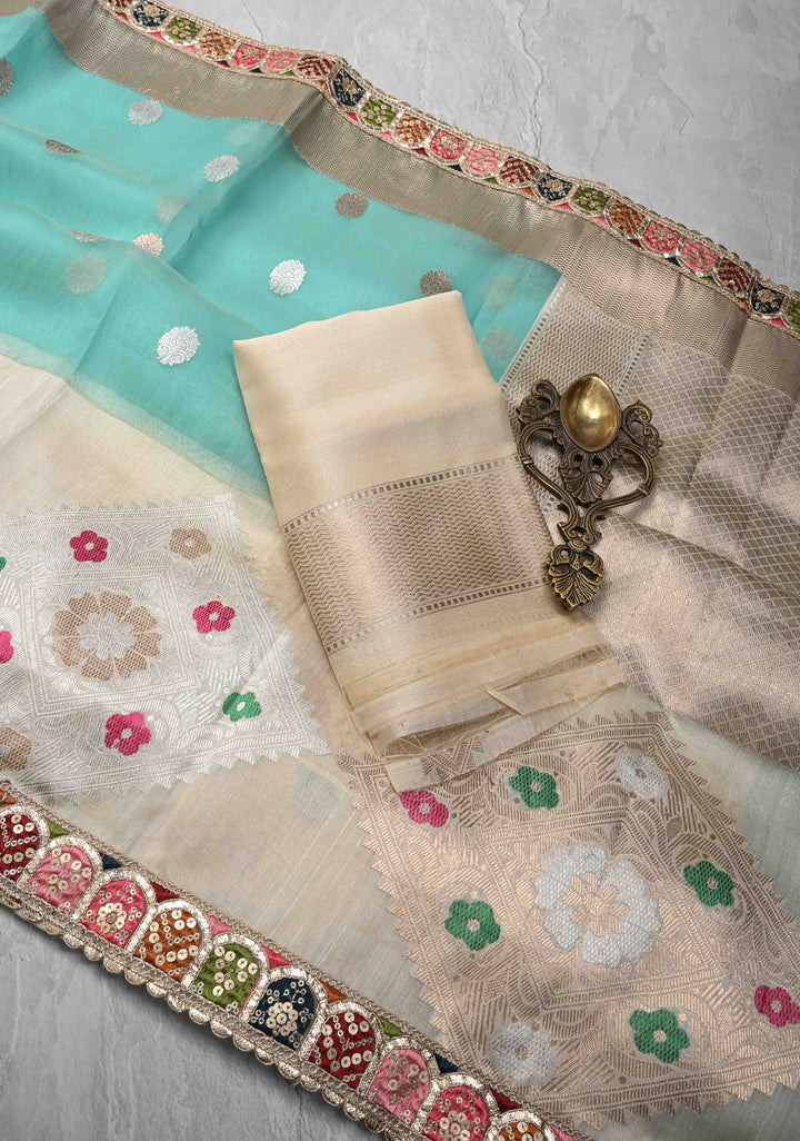 Aqua Blue Banarasi Kora Silk Saree with Sona Rupa Buttas and Kadhiyal Border and multicolor Lace trim| SILK MARK CERTIFIED