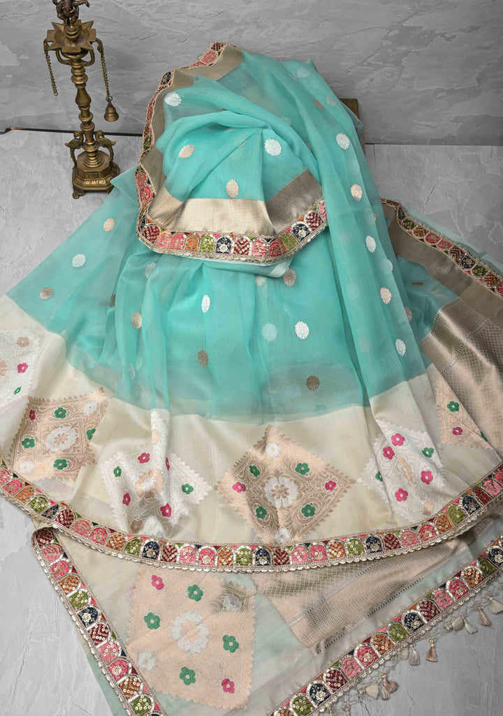 Aqua Blue Banarasi Kora Silk Saree with Sona Rupa Buttas and Kadhiyal Border and multicolor Lace trim| SILK MARK CERTIFIED