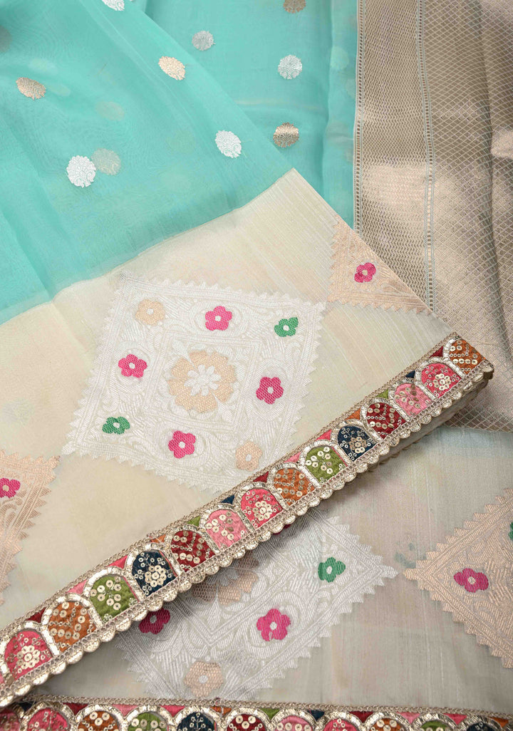 Aqua Blue Banarasi Kora Silk Saree with Sona Rupa Buttas and Kadhiyal Border and multicolor Lace trim| SILK MARK CERTIFIED
