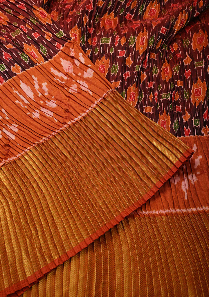 Unique Pleated half and half satin saree with Patola digital print and antique zari