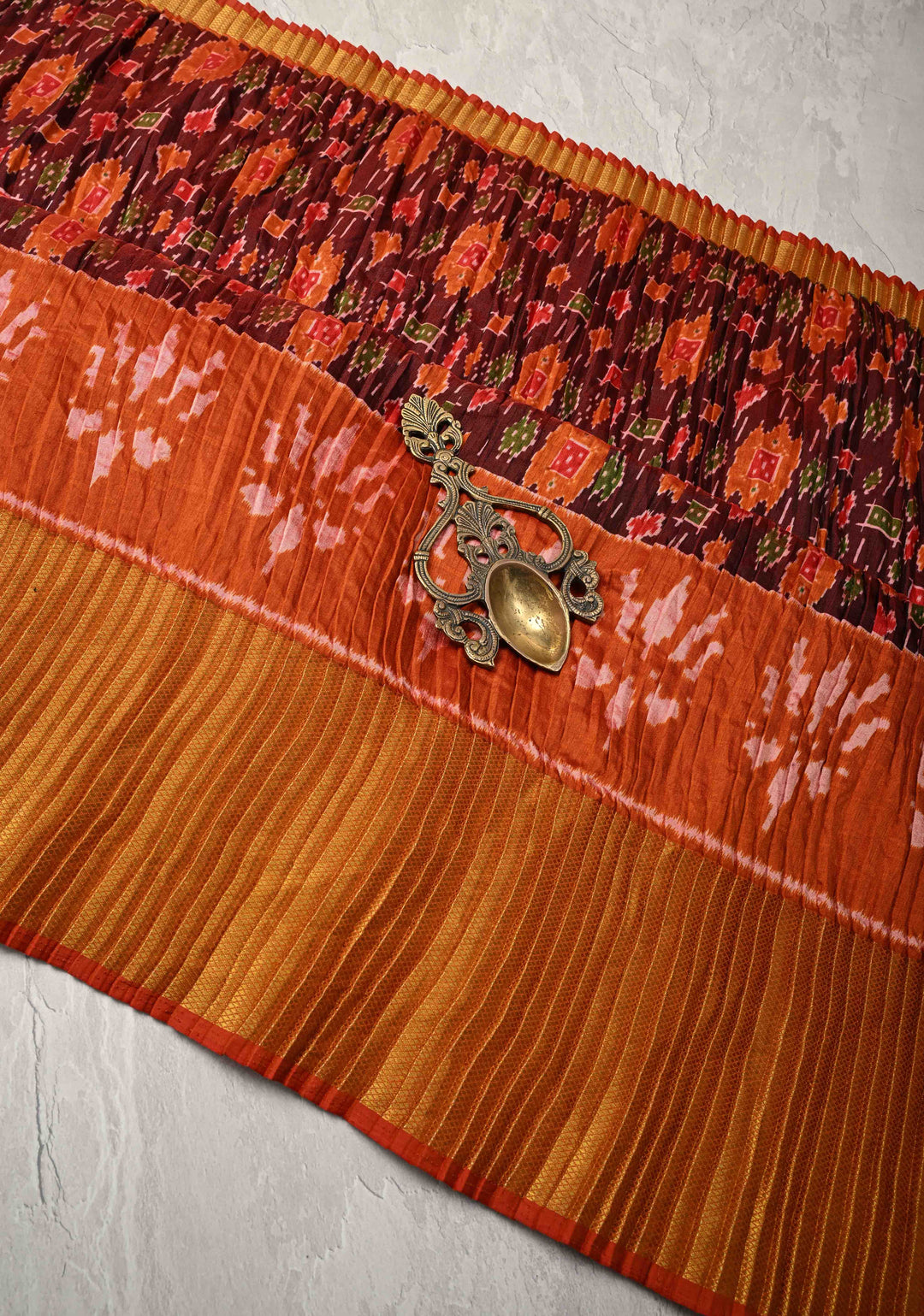 Unique Pleated half and half satin saree with Patola digital print and antique zari