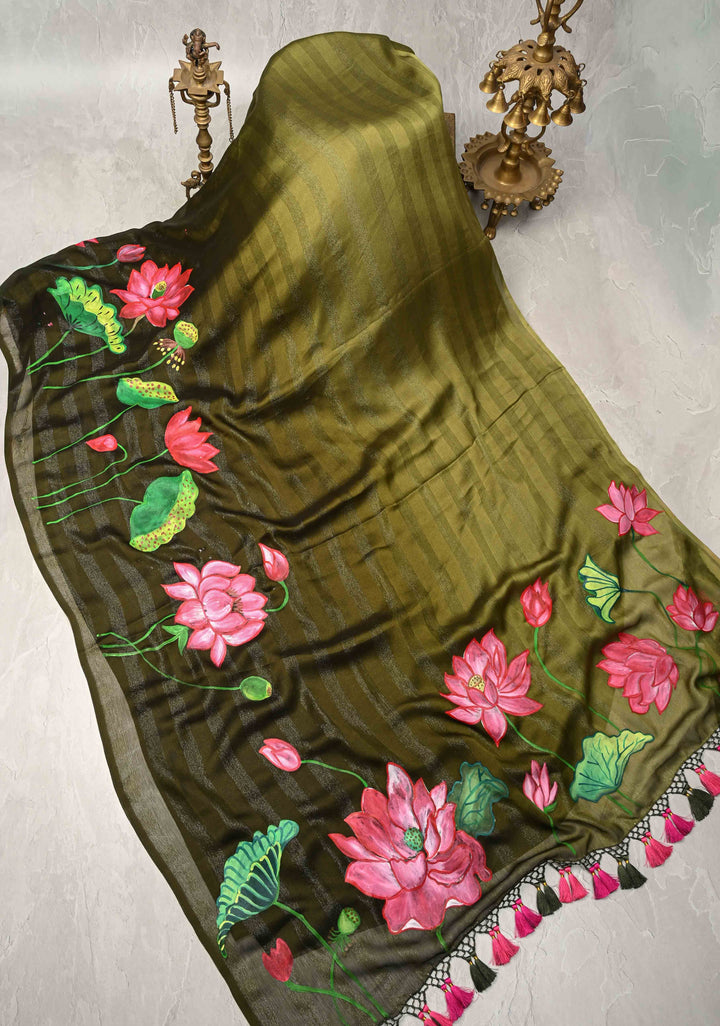 Olive Green Ombre Chiffon Saree with Muted Zari Stripes and Hand painted Lotus Florals