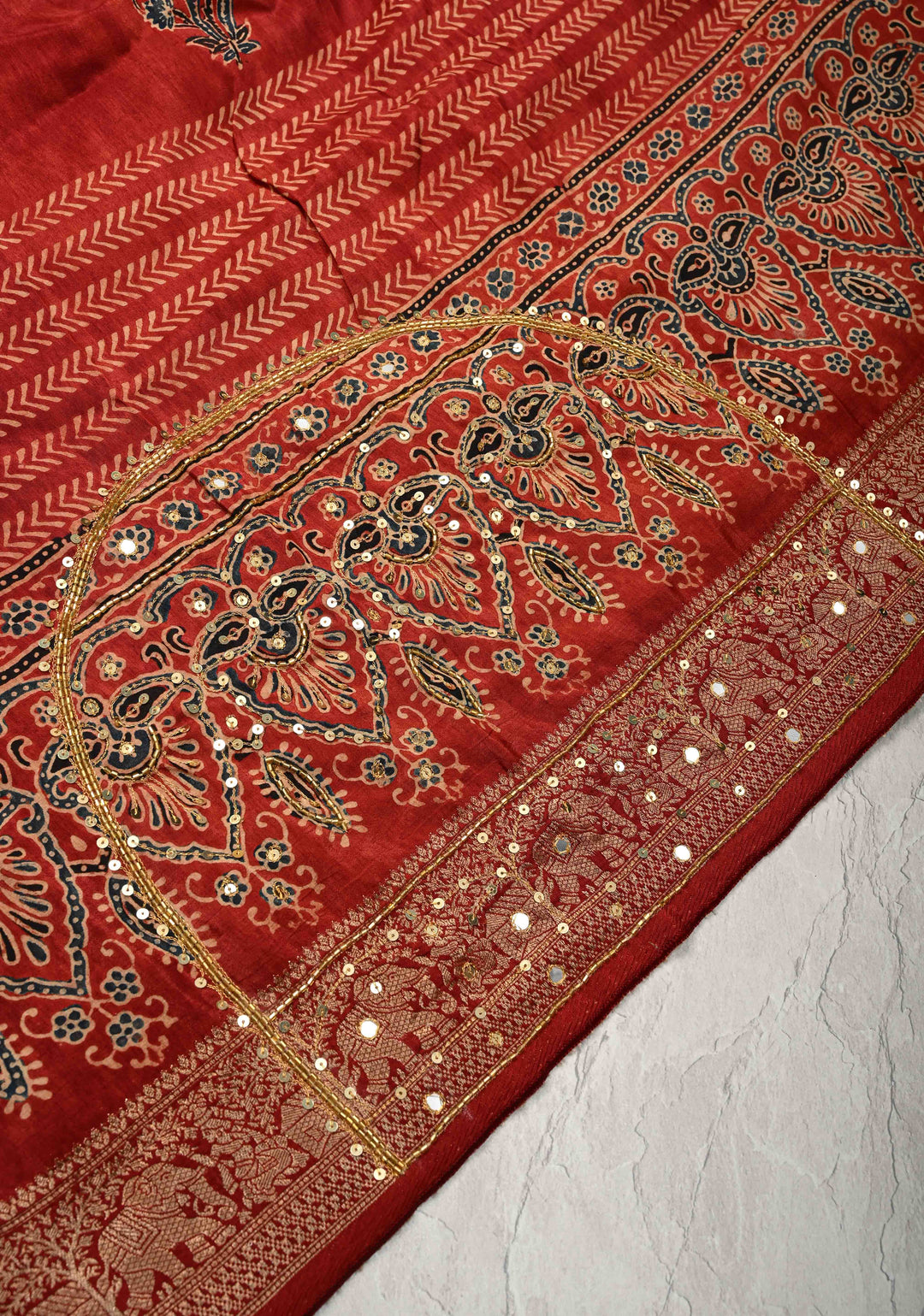 Red Ajrakh Hand Block Print on Dola Silk Saree with Cutdana-Sequins and Mirror Work Hand embroidery