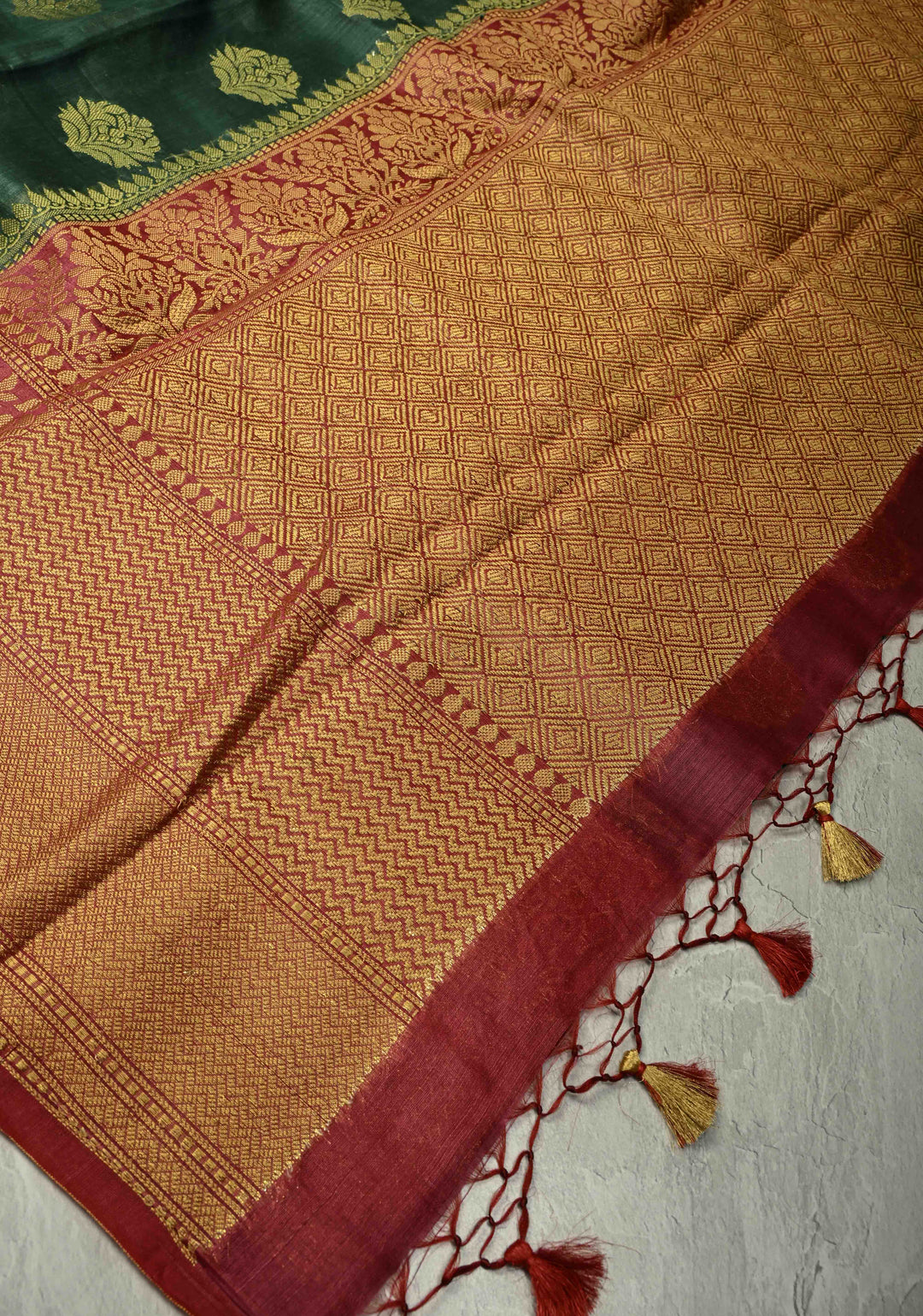 Forest Green Banarasi Linen Saree with Zari Buttas and Contrast Zari Border