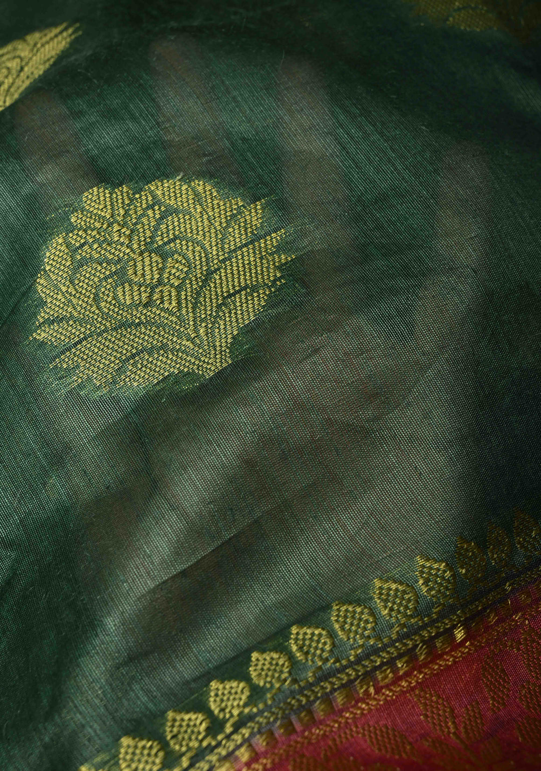 Forest Green Banarasi Linen Saree with Zari Buttas and Contrast Zari Border