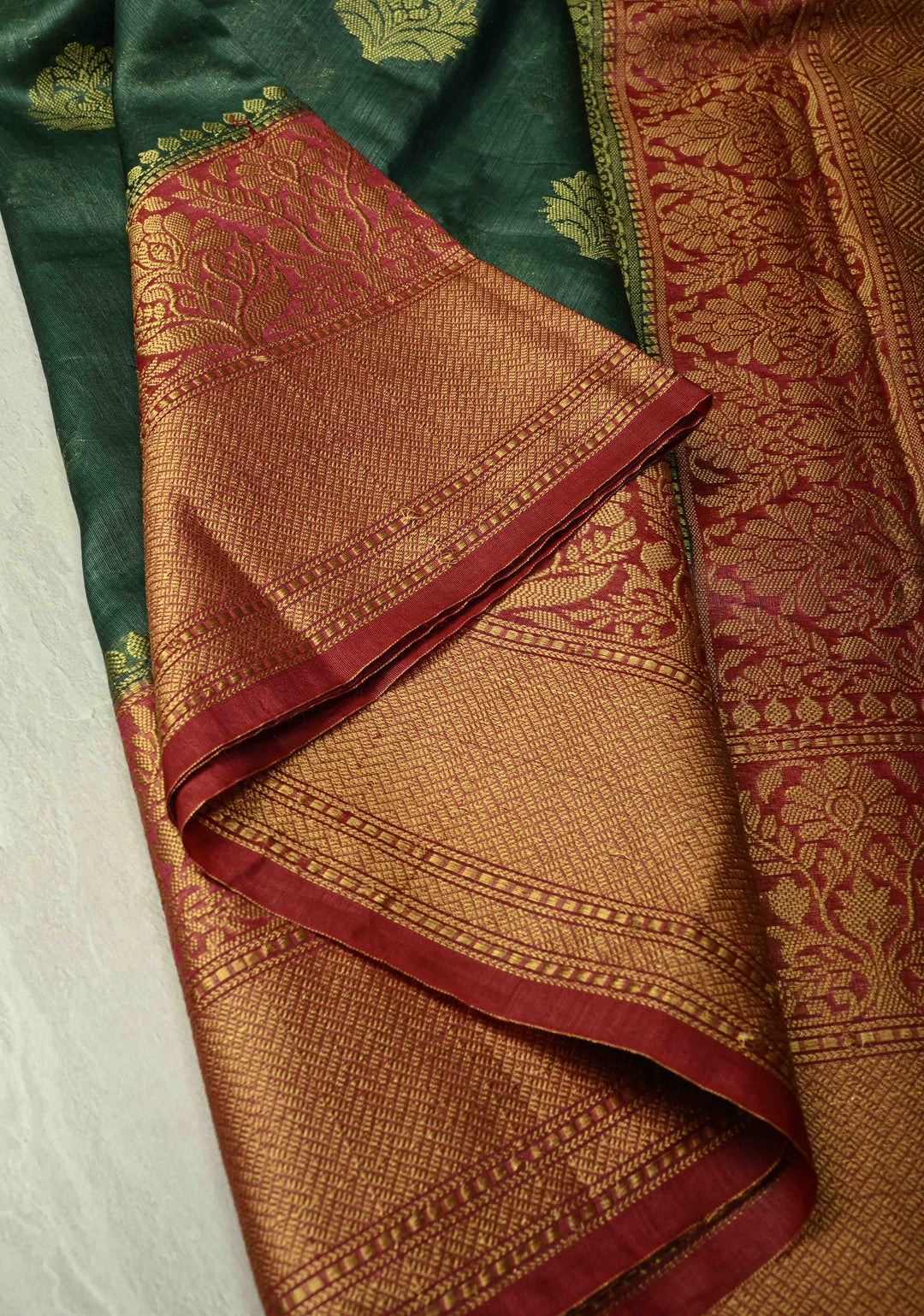 Forest Green Banarasi Linen Saree with Zari Buttas and Contrast Zari Border