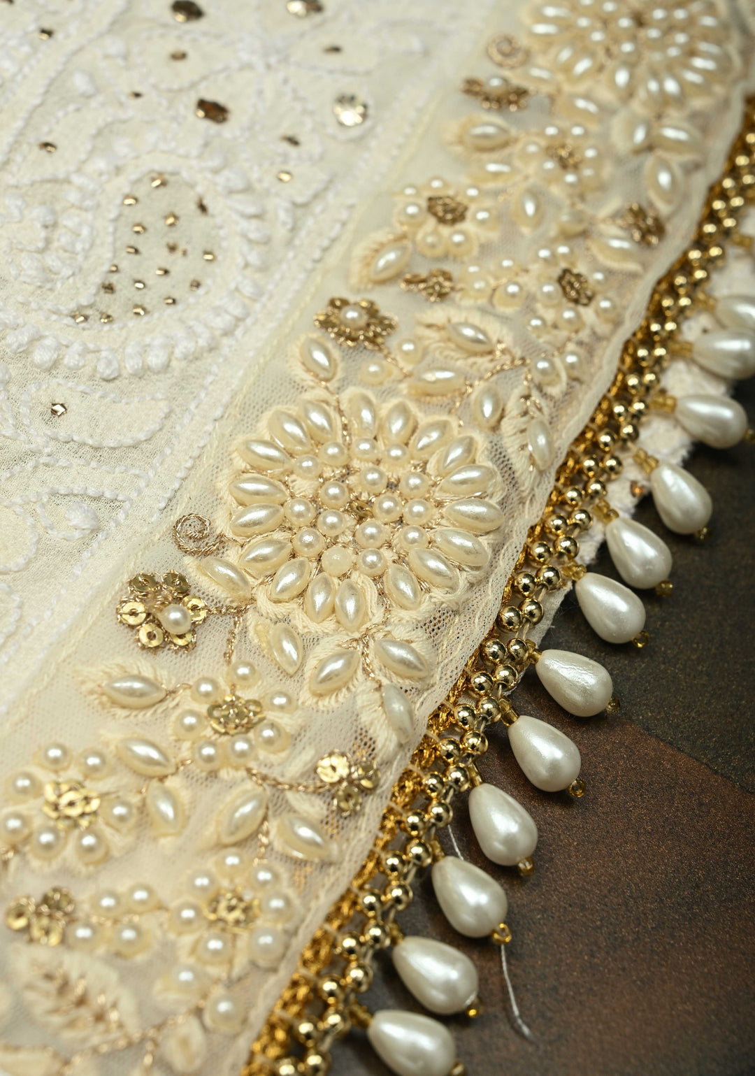 off White Hand Chikankari and Mukiesh Full Jaal Handwork on Pure Georgette Saree with Sequins,Pearls and Satin trim finish