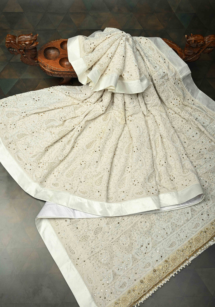 off White Hand Chikankari and Mukiesh Full Jaal Handwork on Pure Georgette Saree with Sequins,Pearls and Satin trim finish