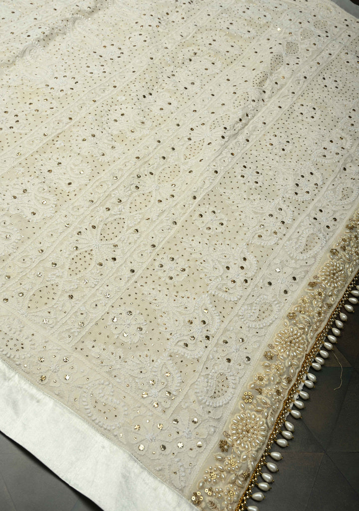off White Hand Chikankari and Mukiesh Full Jaal Handwork on Pure Georgette Saree with Sequins,Pearls and Satin trim finish