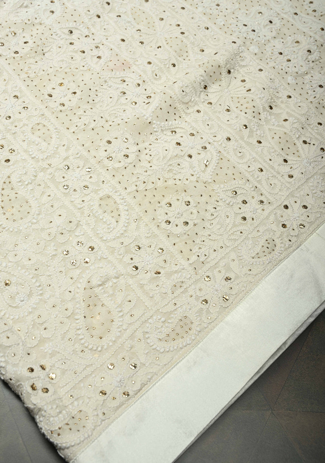 off White Hand Chikankari and Mukiesh Full Jaal Handwork on Pure Georgette Saree with Sequins,Pearls and Satin trim finish