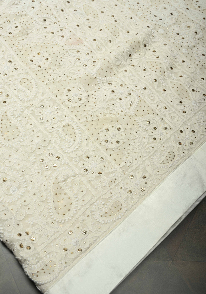 off White Hand Chikankari and Mukiesh Full Jaal Handwork on Pure Georgette Saree with Sequins,Pearls and Satin trim finish