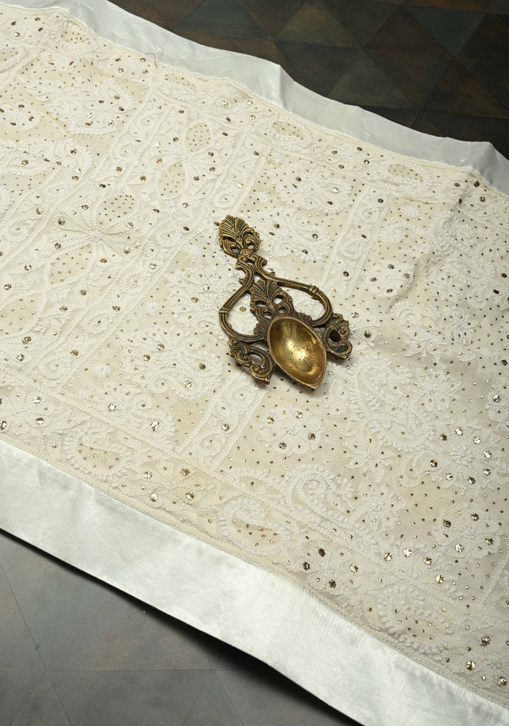 off White Hand Chikankari and Mukiesh Full Jaal Handwork on Pure Georgette Saree with Sequins,Pearls and Satin trim finish