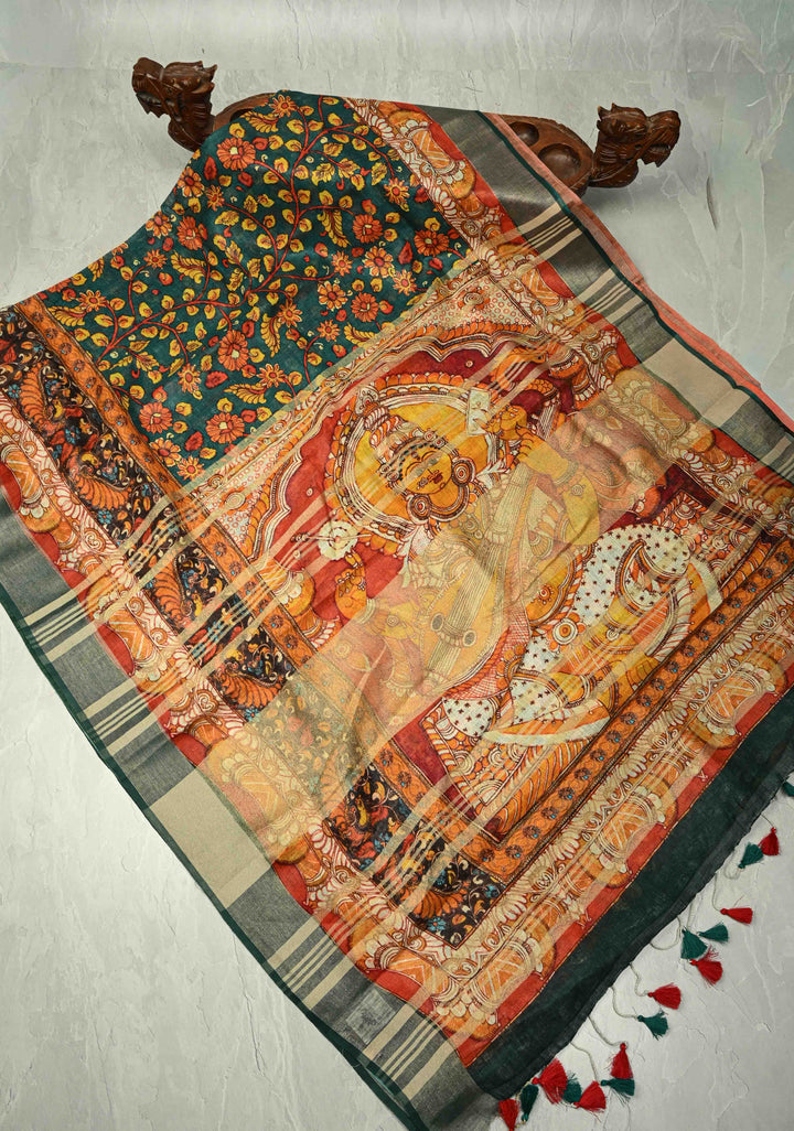 Teal Floral Kalamkari Digital Print on Linen Saree with Devi Motifs on Pallu and Tissue Border