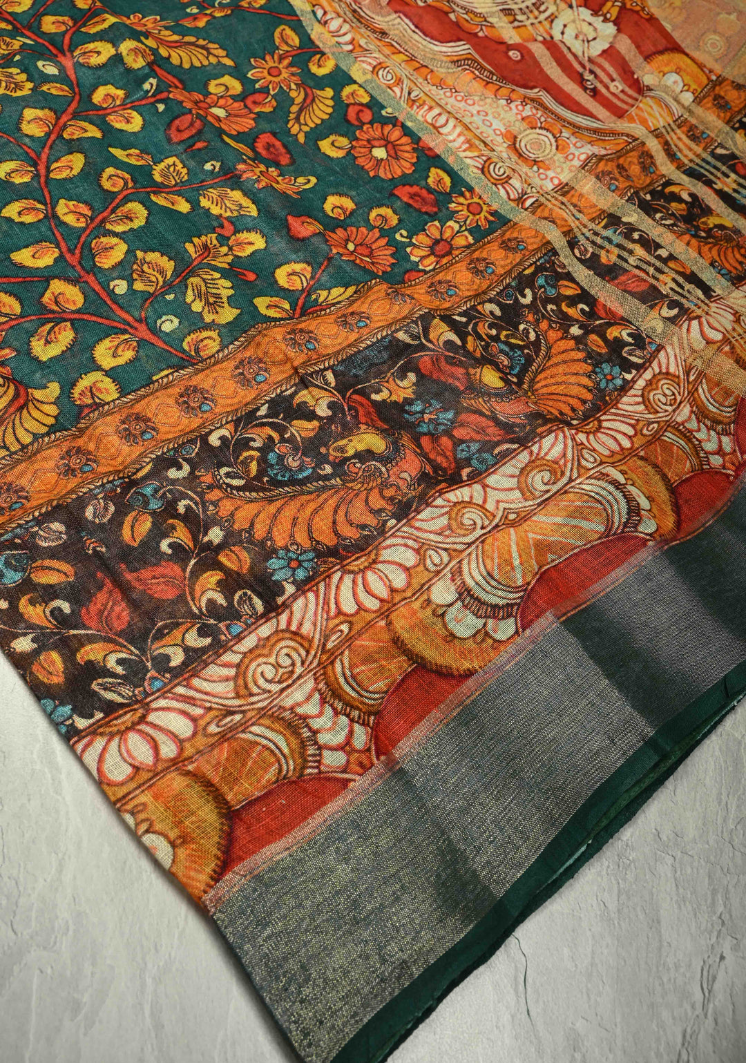 Teal Floral Kalamkari Digital Print on Linen Saree with Devi Motifs on Pallu and Tissue Border