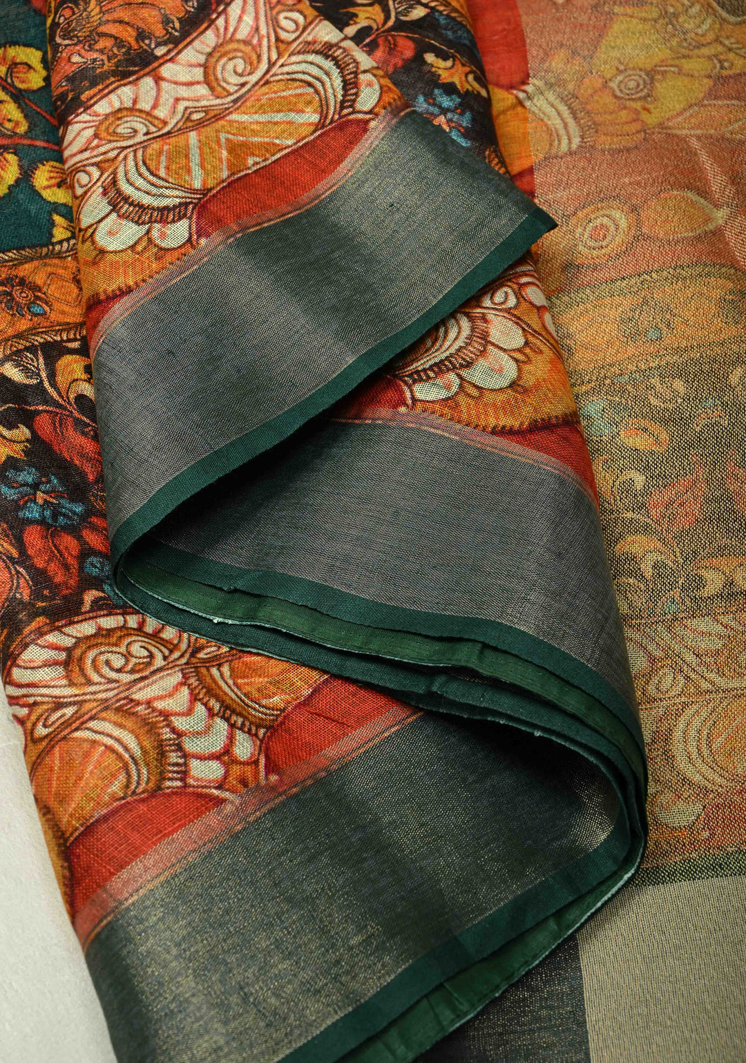 Teal Floral Kalamkari Digital Print on Linen Saree with Devi Motifs on Pallu and Tissue Border