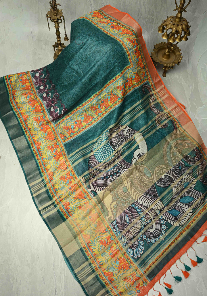 Teal Kalamkari Digital Print on Linen Saree with Peacock Motifs on Pallu and Ganga Jamuna Tissue Border